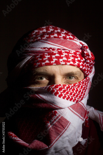 Photo: Man in a Keffiyeh Man in a Keffiyeh