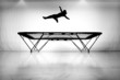 silhouette of gymnast on trampoline silhouette of gymnast on trampoline