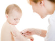 Photo: The doctor makes a baby vaccination on a white background. The doctor makes a baby vaccination on a white background.