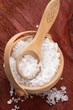 salt crystals in wooden bowl with spoon