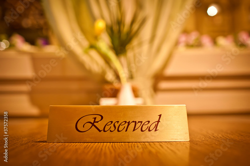 Photo: Reserved sign Reserved sign