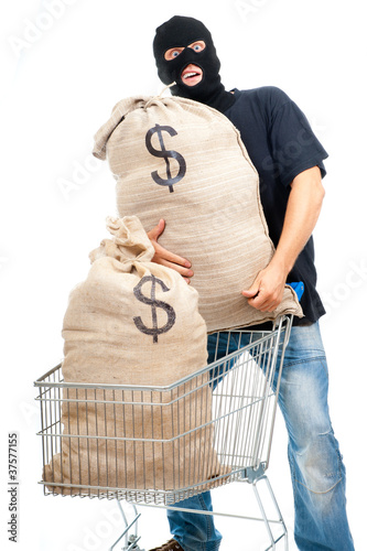 Photo: Happy robber with sack full of dollars Happy robber with sack full of dollars