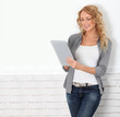 Beautiful modern woman using digital tablet