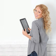 Beautiful modern woman using digital tablet