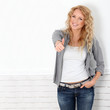 Beautiful blond woman showing thumb up