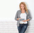 Beautiful modern woman using digital tablet