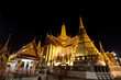 Buddhist temple Grand Palace at night in Bangkok, Thailand