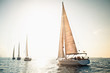 Sailing ship yachts with white sails