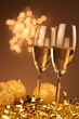 Christmas glasses of Champagne and golden background Christmas glasses of Champagne and golden background
