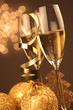 Christmas glasses of Champagne and golden background Christmas glasses of Champagne and golden background