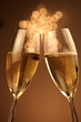 Christmas glasses of Champagne and golden background Christmas glasses of Champagne and golden background