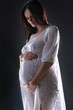 pregnant female holding her breasts pregnant female holding her breasts