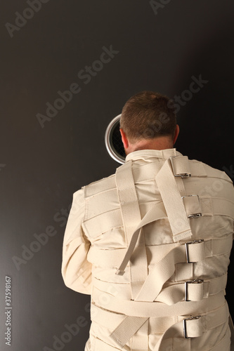 Photo: Waiting in a straitjacket Waiting in a straitjacket