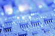 Circuit board in a blue tone with components photographed