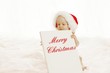 Baby with x-mas billboard