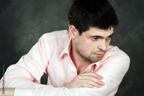 Photo: Young man in pink shirt Young man in pink shirt