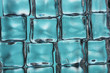 Ice cubes on blue closeup