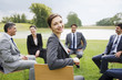 Business people having meeting outdoors