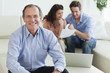 Financial advisor sitting in living room with couple