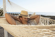 Man taking nap in hammock