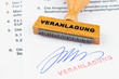 Holzstempel auf Dokument: Veranlagung