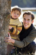 Father walking in the woods with his child