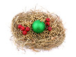 Christmas wreath with ornaments on white background.