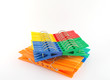 Sets color clothes-pegs over white