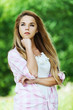 serious woman holding her hand under the chin