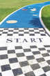 Start label on cute jogging lane in garden