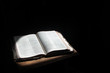 Photo: Open bible lying on a table Open bible lying on a table