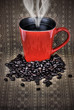 Grunge red coffee mug and beans Grunge red coffee mug and beans