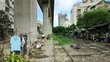 slums by railway in bangkok
