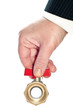 Photo: a hand closing a faucet a hand closing a faucet