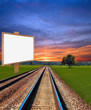 Railway in field with placard Railway in field with placard