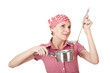 Photo: Playful housewife with ladle and pan Playful housewife with ladle and pan