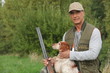 Photo: Hunter crouching by dog Hunter crouching by dog