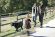 Family with dog in the countryside