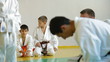 Martial arts instructor training  students