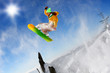 Snowboarder jumping against blue sky