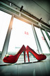 A ledge on the red high heels