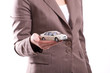 Woman's hand holding the model of car Woman's hand holding the model of car