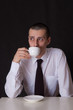 sad businessman drinking coffee sad businessman drinking coffee