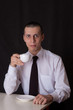 weird businessman drinking coffee weird businessman drinking coffee