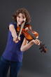 Girl having fun with a violin