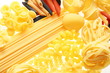 Close up shoot of different types of  raw pasta.