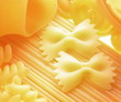 Close up shoot of different types of  raw pasta.