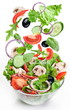 Flying vegetables - salad ingredients.