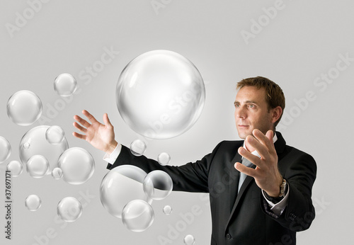 Foto: Businessman with bubbles Businessman with bubbles