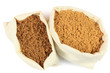 Two types brown sugar in white fabric bags. Two types brown sugar in white fabric bags.